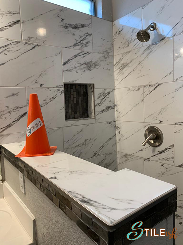 carrara look tile bathroom